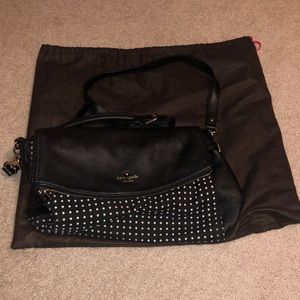 Kate spade black with white polka dotted purse.
